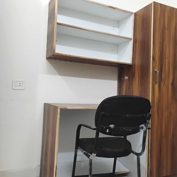 Quiet study desk setup in Radha Raman PG Kota